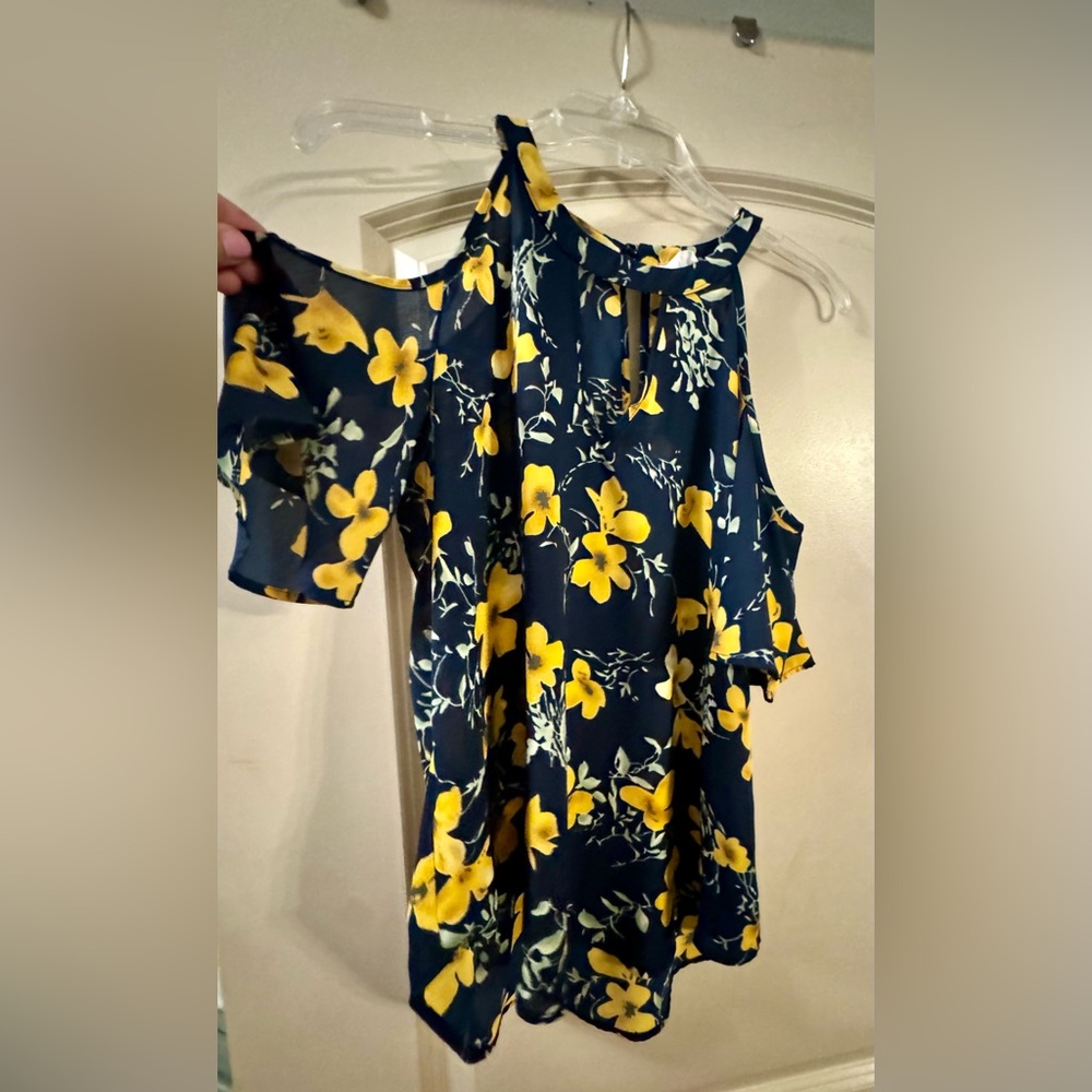 Navy and yellow shirt. Shoulder sleeves out